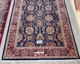 Lot 1012	Buy it Now $195.00  Stately Karastan Area Rug. Wool.  Design 786. Navy trim, tan, red, blue colors.  Needs a good cleaning, no obvious stains.   74"l  x 51" w	