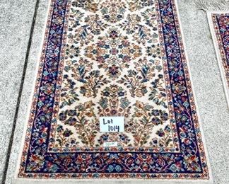 Lot 1014 Lovely Karastan Rug. Looks to have some discoloring on half of rug (signs of sun?). Needs a good cleaning. 	55" x 30"	$85.00