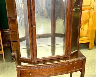 Lot 1022	Buy it Now $225.00  Antique Curio Cabinet w/drawer & glass shelves. Shelves are adjustable in heights. 54.5" x 25"w x 12" d  Glass Shelves inside Desk Drawer.