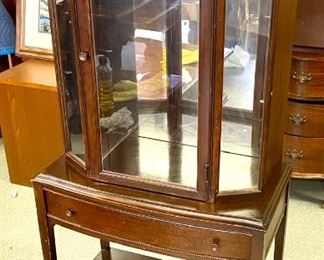 1022	Antique Curio Cabinet w/drawer & glass shelves. Shelves are adjustible in heights. 	54.5" x 25"w x 12" d