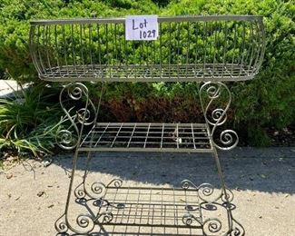 Lot 1029  Buy it Now $115.00  Awesome Vintage Wire Planter Holder.  I'm sorry we don't have measurements on this beauty, but it's fairly standard Planter Size.   So.Very.Nice.