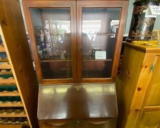 Lot 994  $275.00  Antique Secretary Desk with Glass Doors and 3 Drawer bottom The Inside Desk Top is in rough shape	30" W x 17" D x 80" T