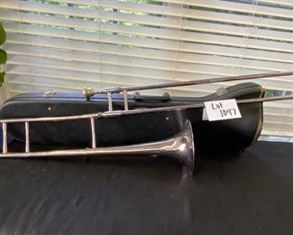 Lot 1047  $120.00  Buescher Trombone in Nickel Chrome with Custom case