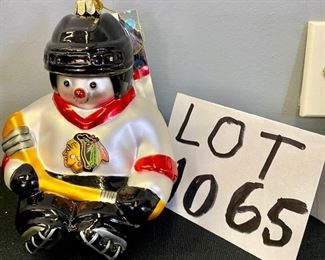 Lot 1065 Buy it Now $10.00  Snowman Blackhawks ornament. Blown glass with NHL trademark.