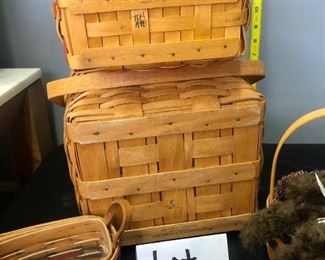 Lot 1102. Buy it Now $200.00  .  Patriotic Longaberger Lot. (8 pc) 2 inaugural baskets 1993 and 1997, 1- 25th Anniv Basket, 1- Small 2 handled basket, 2 sweet bears, 1 Picnic Basket with lid and fastener, and 1 small discovery basket.  All with liners, a few with liners and fabric protectors.   
