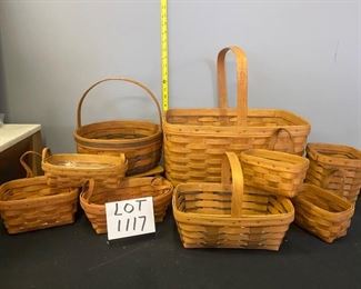 Lot 1117. Buy it Now  $140.00  Lot of 9 Longaberger Baskets. Lg handled picnic basket (15.5"x11x9"h, 1991), Oval double handled basket (9x5x3", 1990), 2 key baskets w/1 handle (6x4x3). large key basket (7x5x4), oval double handled basket (8x4x2.5, 1992), rectangle w/green trim (10x6.5x4, 1991). round one handled basket (10"diax"h, 1989),  utensil basket (5.5x6.5).  Liners and protectors included as pictured.  