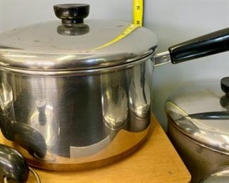 Lot 1125.  5 pc. Revere ware Copper Clad Pans #88. With lids. All in need of some cleaning, but in great structural condition.  2, 3/4 qt. small saucepans. 2, 2 qt. med saucepan. 1, 4 qt. larger pan.  $60