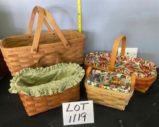 Lot 1119. Buy it Now $49.00. Lot of 4 wonderful Longaberger baskets.  Smaller basket with 2 handles and liner (7x5x4, 1997), one handled basket + cloth liner, red trim (14x6.5x3", 1995), a beautiful old picnic basket (14x8x6, 1986!), key basket w/one handle and fabric liner (9x5x5, 1989).    