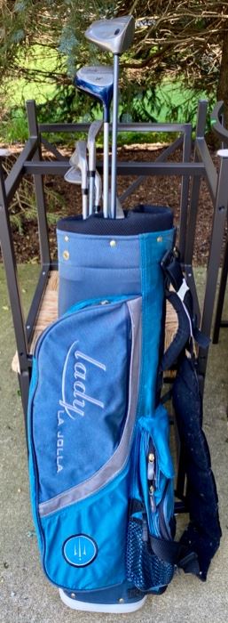 Lot 1246. Lady LaJolla Golf Set including 5/6 Iron, 7/8 Iron, 9/P, 5/7 Wood, Calloway driver and Wilson putter. 2 pkgs golf balls included. Lady LaJolla bag.  Great Starter Set!