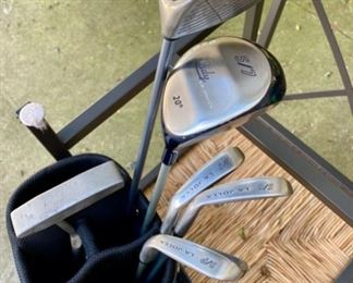 Lot 1246. Lady LaJolla Golf Set including 5/6 Iron, 7/8 Iron, 9/P, 5/7 Wood, Calloway driver and Wilson putter. 2 pkgs golf balls included. Lady LaJolla bag. $48 Great Starter Set
