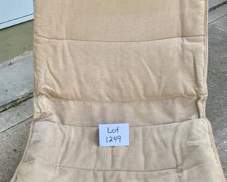 Lot 1249. Folding chair with tubular frame and corduroy sling cover. Integrated pillow. Low slung: 36" ground to top of chair back, approximately 13" ground to seat.  $30