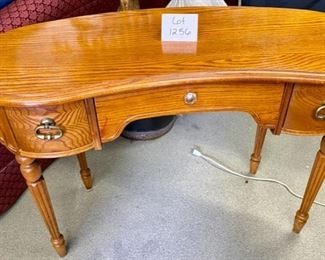 Lot 1256. Lexington Kidney Shaped Writing Desk or Vanity with 3 Drawers in Maple	44" L x 19" D x 30" T.  $125. has small ink mark that may be able to be removed, but you can't beat the Lexington craftsmanship. Plus this desk is darling!
