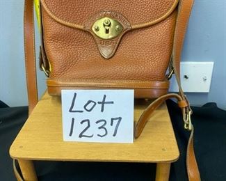 Lot 1237. Dooney & Bourke Crossbody Camel Leather Handbag light usage but not a problem. $45. Beautiful bag $45