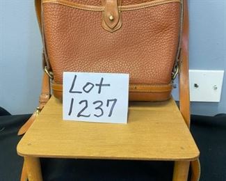 Lot 1237. Dooney & Bourke Crossbody Camel Leather Handbag light usage but not a problem. $45