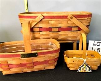Lot 1157. 3 pcs. Longaberger baskets, 1990 Gingerbread basket, sm. Easter basketw/Longaberger ornament, open picnic basket.  $42