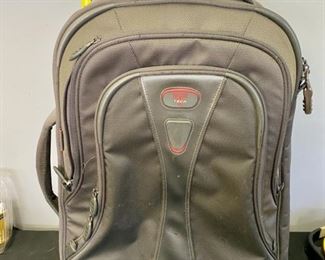 Lot 1289. $48.00 Tumi T-Tech 22" suitcase.in green.  Very Nice 