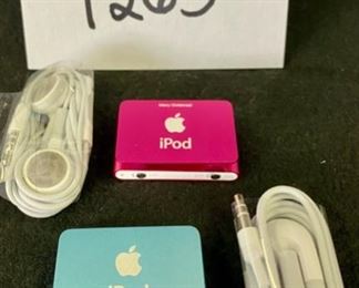 Lot 1265. Buy it Now $35.00 Pair of Apple iPod Shuffles with 2 Earbuds and USB Power Cord (Not Pictured). 