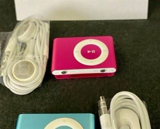 Lot 1265.Buy it  Now $35.00 for Pair of Apple iPod Shuffles with 2 Earbuds and USB Power Cord (Not Pictured). 