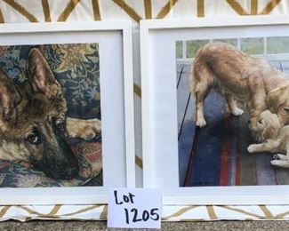 Lot 1205. Set of 2 cute pup prints in white frames. Each measures 19" x 15". $45