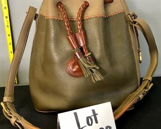 Lot 1199.  Dooney and Bourke Leather green slouchy shoulder bag.  (Hobo?).  $75