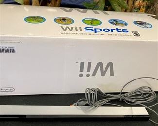 Lot 1269. Buy it Now $75.00. Nintendo Wii Console with 2 Remote Controllers, 2 Nunchucks, Power Cords, TV Adapter, and Original Box Complete 