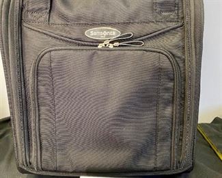 Lot 1310. Samsonite rolling, carry-on bag.  Fits under the seat. 13"x16".   $45