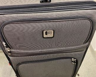 Lot 1312. Kenneth Cole Reaction  Large Pullman Suitcase  32" x 21". $75