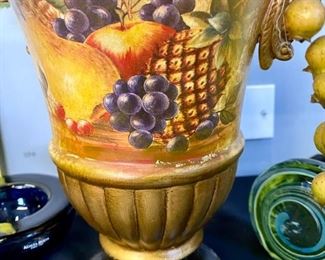 Lot 1315. 1 Floral & fruit Centerpiece is interesting in a hand-painted urn,  Kosta Boda Art Glass Cobalt Blue Votive, 1  Art Glass Paperweight. $48