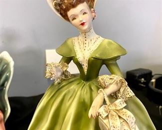 Lot 1316. Beautiful Florence Ceramics Figurines. Rebecca in blue dress, Georgette in green dress, Victoria on sofa.   $120