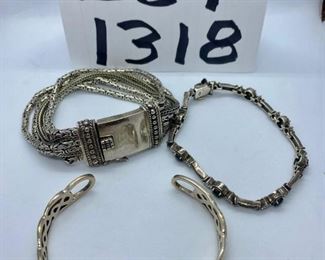 Lot 1318. $55.00.  Three beautiful sterling silver bracelets. 1 sterling cuff bracelet, Reticulated, One sterling bracelet with semi-precious stones, and Six Strand Necklace with a plate atop that could be monogrammed.  92.3 grams silver.          