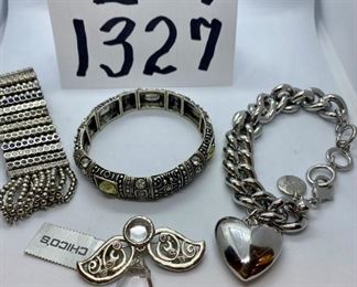 Lot 1327. $50.00.  4 pc. Jewelry Lot - Chico's Angel Crystal Pin, NWT, Chico's Stretchy Bracelet, Chico's Chain Bracelet with heart pendant in chrome, and another chain bracelet, unbranded.		