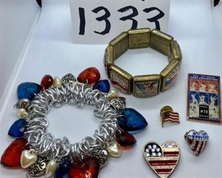 Lot 1333. $20.00.  Red, White, and Blue Patriotic Lot- One vintage bracelet with heart-shaped beads on a stretchy band; two heart-shaped American flag pin, another tiny flag pin, and a Cubs Convention pin honoring Ron Santo.  And a stretchy bracelet featuring patriotic "scenes" - so cool!		