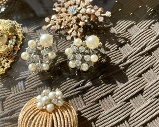 Lot 1344. Wonderful 11 piece lot of vintage jewelry.  11 Antique or Costume jewelry. Super cool rhinestone snowflake pin, Rhinestone and pearl earrings, gold-tone earrings. 2 ivory pearl bracelets, 2 interesting 	vintage shoe or pocket buckles, gold tone and silver heart necklace, pineapple broach... 	$75.00