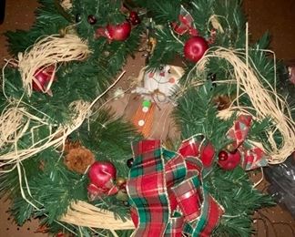 Lot 1347.  $30.00.  Large Holiday Wreath with a sweet old Scarecrow and apples, bright ribbons  