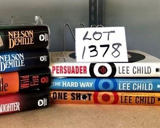 Lot 1378. $14.00.  Lot of 7 books by Lee Childs, & Nelson Demille