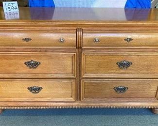 Lot 1394. $295.  Lexington Honey Oak, 6 drawer dresser.  56"x18.5"x31.5"t. GREAT CONDITION! It matches Lingerie chest in Lot#1091. 