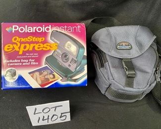 Lot 1405. $20.00. Polaroid Instant Camera and Case.