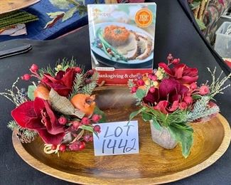 Lot 1442. $18.00.  Pretty Pottery Barn Carved wooden bowl (20"x12"), 2 Fall floral arrangements and a book of "Thanksgiving and Christmas Recipes containing 200 top recipes