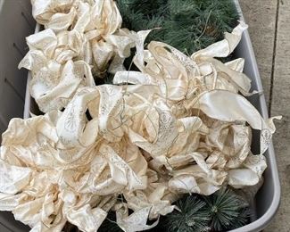 Lot 1461.  $70.00. Gorgeous glitter accented pine garleand, lit with 17 cream-colored brocade bows! Large storage tub included.  Merry Christmas