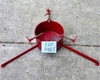 Lot 1465.  $25.00. Large, red, iron tree stand 9" well and 12" legs.  		