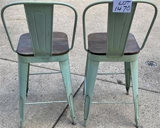 Lot 1470.  $100/pair. Lot of 2 vintage (we think or real good faux vintage) Barstools.  18"wx21"dx41"t.  Industrial metal frame with nicely finished wood seat. Nice weight to the chairs. 