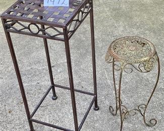 Lot 1472.  Two metal plant stands $28