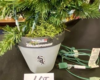 Lot 1474.  $38.00. For your favorite SOX fan!! White Sox lighted Christmas tree with Sox ornaments.  Tree stands in a cute gray and black pot with Sox Logo	38"t	