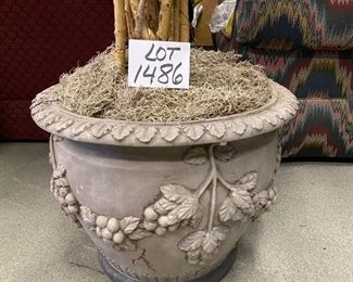LOT 1486.   $95.00. Large Faux Ficus Tree in Composite VasE  with Grape Vines in Relief 
