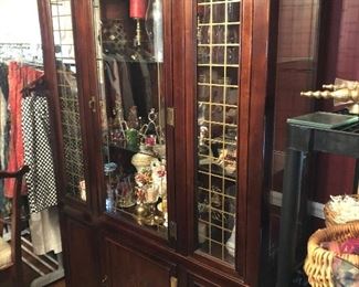 Very nice lighted china cabinet which  is 51 x 17 x 77.