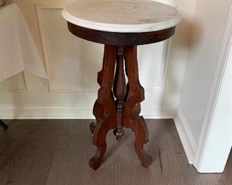 #4	Antique marble oval top table 19"x17"x30"	 $75.00 
