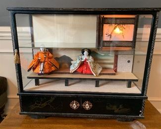 #13	Asian music box display cabinet with 2 drawers and 2 dolls 29'x10"x25"	 $75.00 
