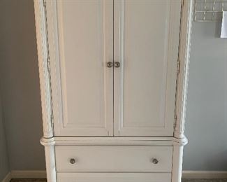 #20	Wardrobe or media cabinet with 3 shelves, 4 drawers, and power strip 39"x20"x72"	 SOLD
