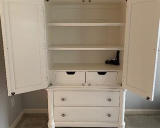 #20	Wardrobe or media cabinet with 3 shelves, 4 drawers, and power strip 39"x20"x72"	 SOLD
