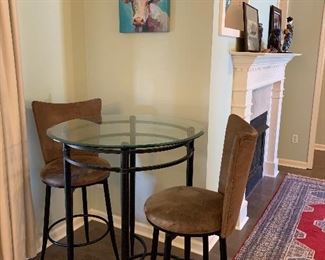 #18	Glass top bar height table with 2 barstools 34"x42"	 $60.00 
Rug not for sale
